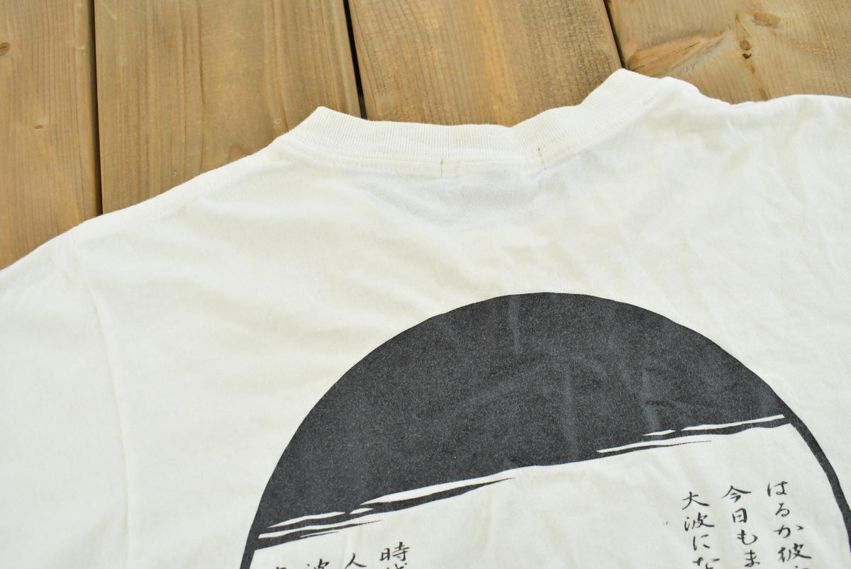 Vintage 1990s Japanese Surf Island Wave God Kanji T-Shirt Men's S from propervintagecanada