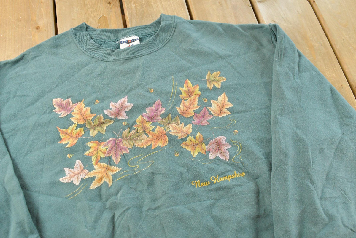 Vintage 1990s Jerzees New Hampshire Autumn Leaves Crewneck Sweater Men's L from propervintagecanada