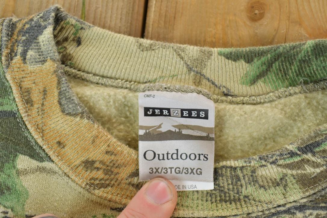 Vintage 1990s Jerzees Outdoor Realtree Camo Crewneck Sweatshirt Men's 3XL from propervintagecanada