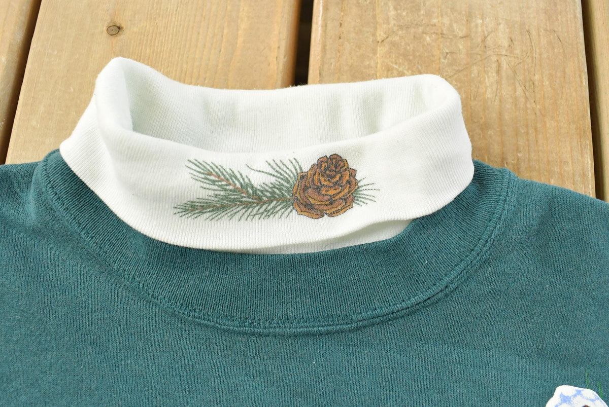 Vintage 1990s Jerzees Snow Birds Turtleneck Crewneck Sweater Men's M from propervintagecanada