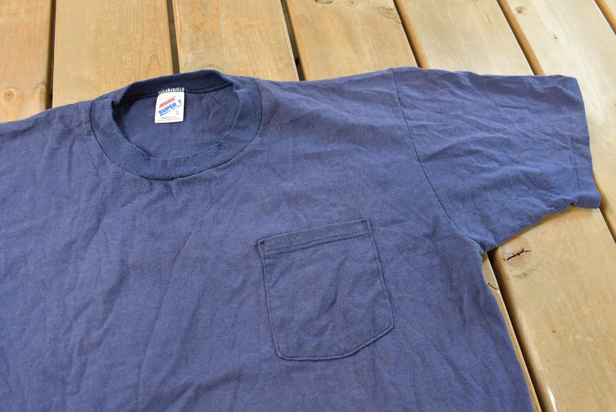 Vintage 1990s Jerzees Super T Blue Blank Pocket T-Shirt Men's L from propervintagecanada