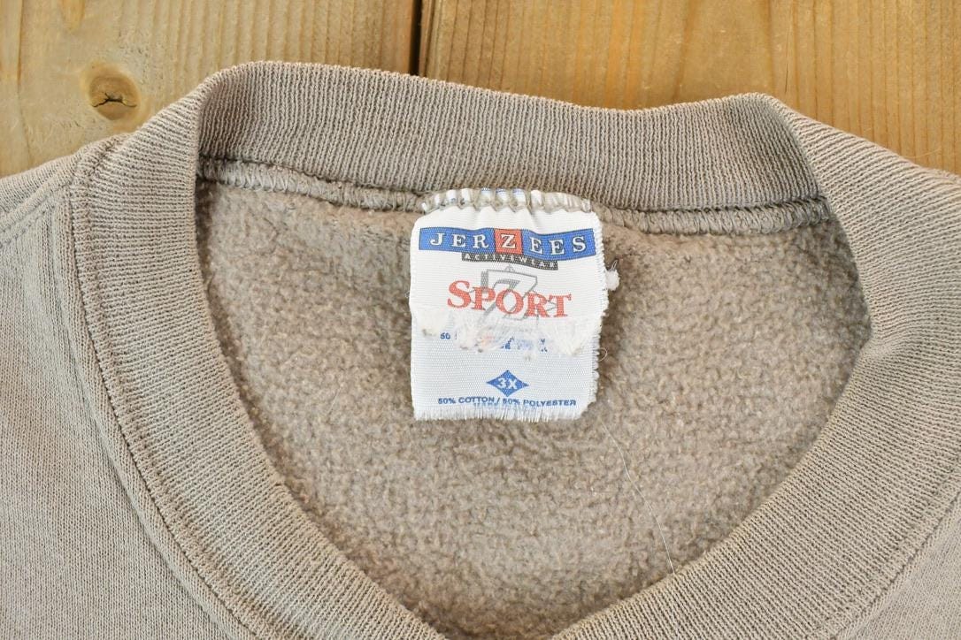 Vintage 1990s Jerzees Z Sport Blank Crewneck Sweatshirt Men's 3XL from propervintagecanada