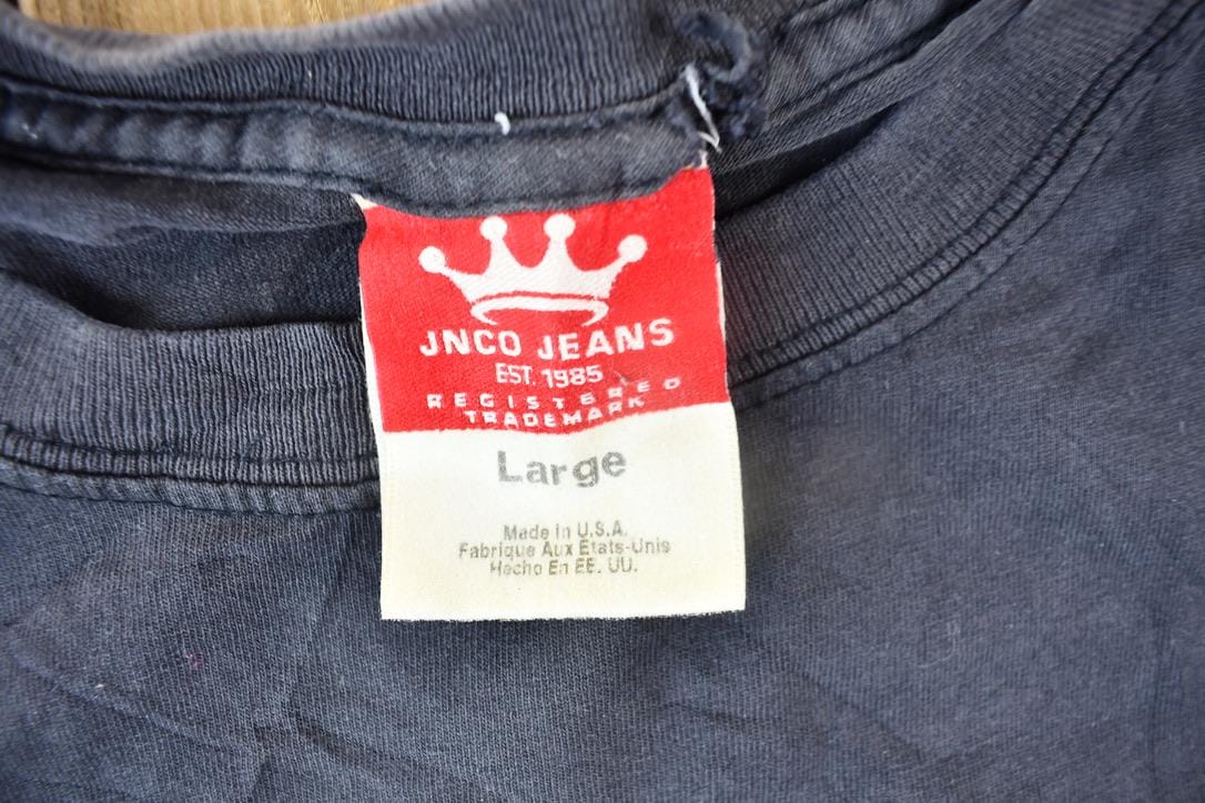 Vintage 1990s JNCO Jeans Skull Flame Graphic T Shirt Men's Large from propervintagecanada