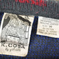 Vintage 1990s K Cosa Leather Patch Abstract Knit Crewneck Sweater Men's L from propervintagecanada