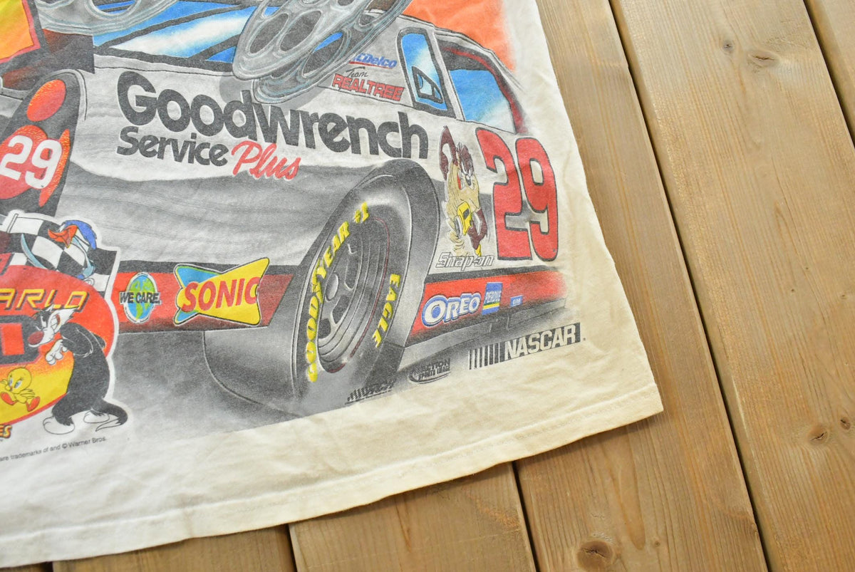 Vintage 1990s Kevin Harvick Looney Tunes All Over Print All Tuned Up NASCAR Racing T-Shirt Mens L from propervintagecanada