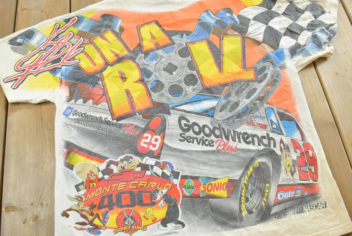 Vintage 1990s Kevin Harvick Looney Tunes All Over Print All Tuned Up NASCAR Racing T-Shirt Mens L from propervintagecanada