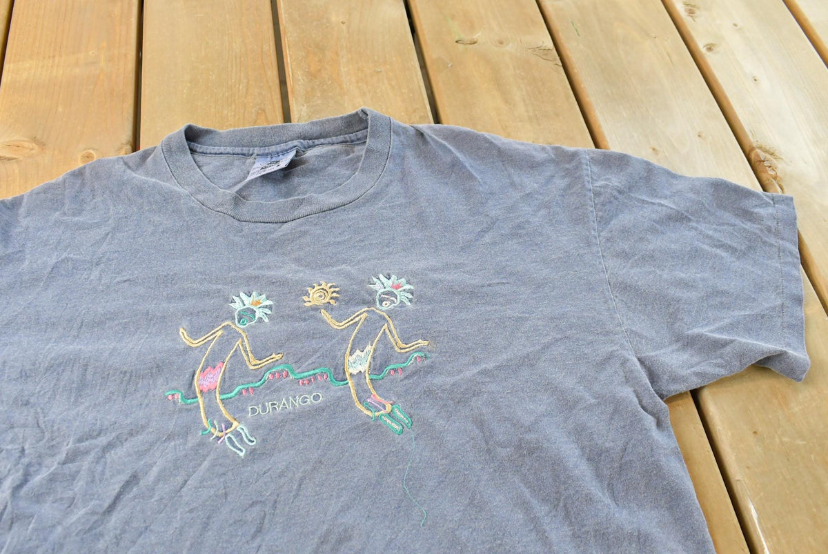 Vintage 1990s Kokopelli Navajo Art Graphic Durango T Shirt Men's Men's Large from propervintagecanada
