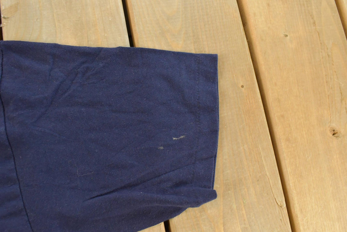 Vintage 1990s La Connoisseur Graphic T-Shirt Men's L from propervintagecanada