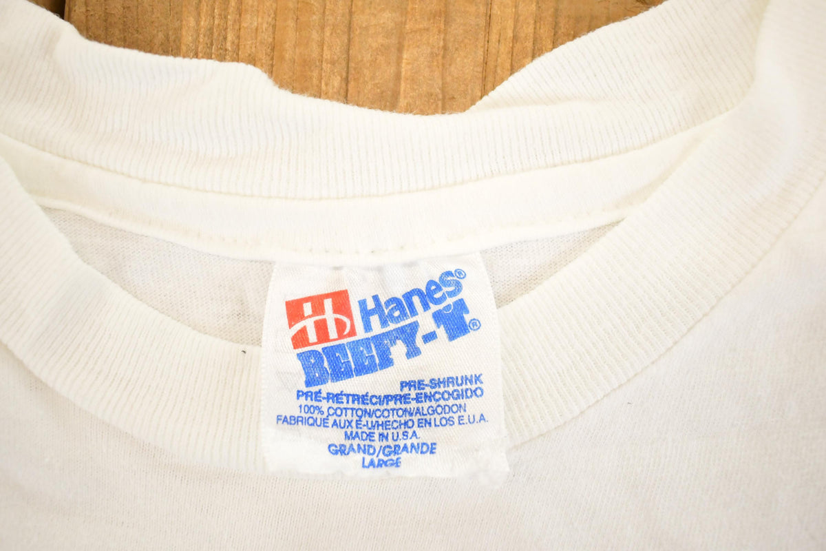 Vintage 1990s Lake Michigan Catholic Lakers Collegiate T-Shirt Men's M from propervintagecanada
