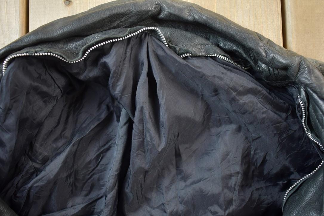 Vintage 1990s Leather Biker Jacket Made In USA from propervintagecanada