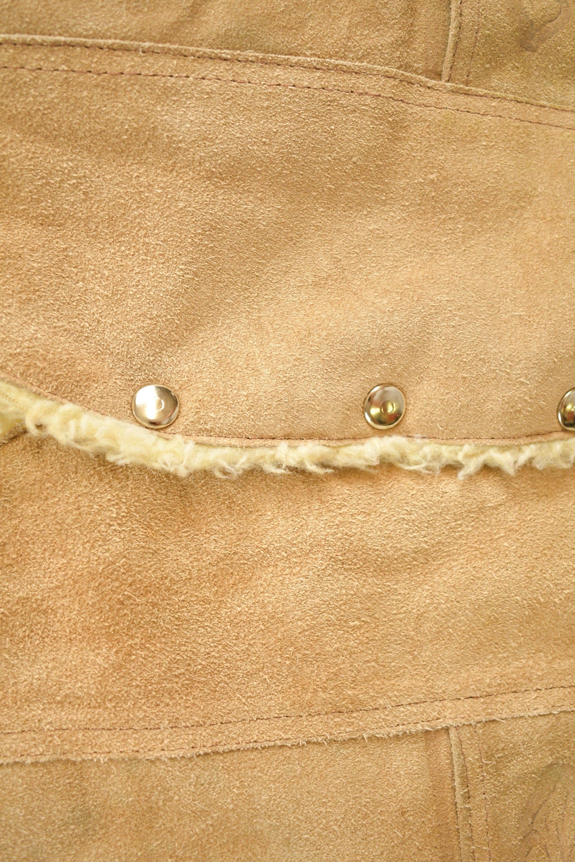 Vintage 1990s Leather Horse Western Sherpa Vest Men's Medium from propervintagecanada