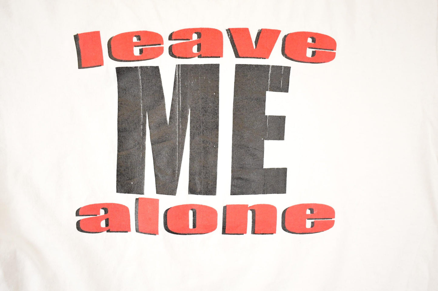 Vintage 1990s Leave Me Alone Big Text Souvenir Attitude T-Shirt Men's L from propervintagecanada
