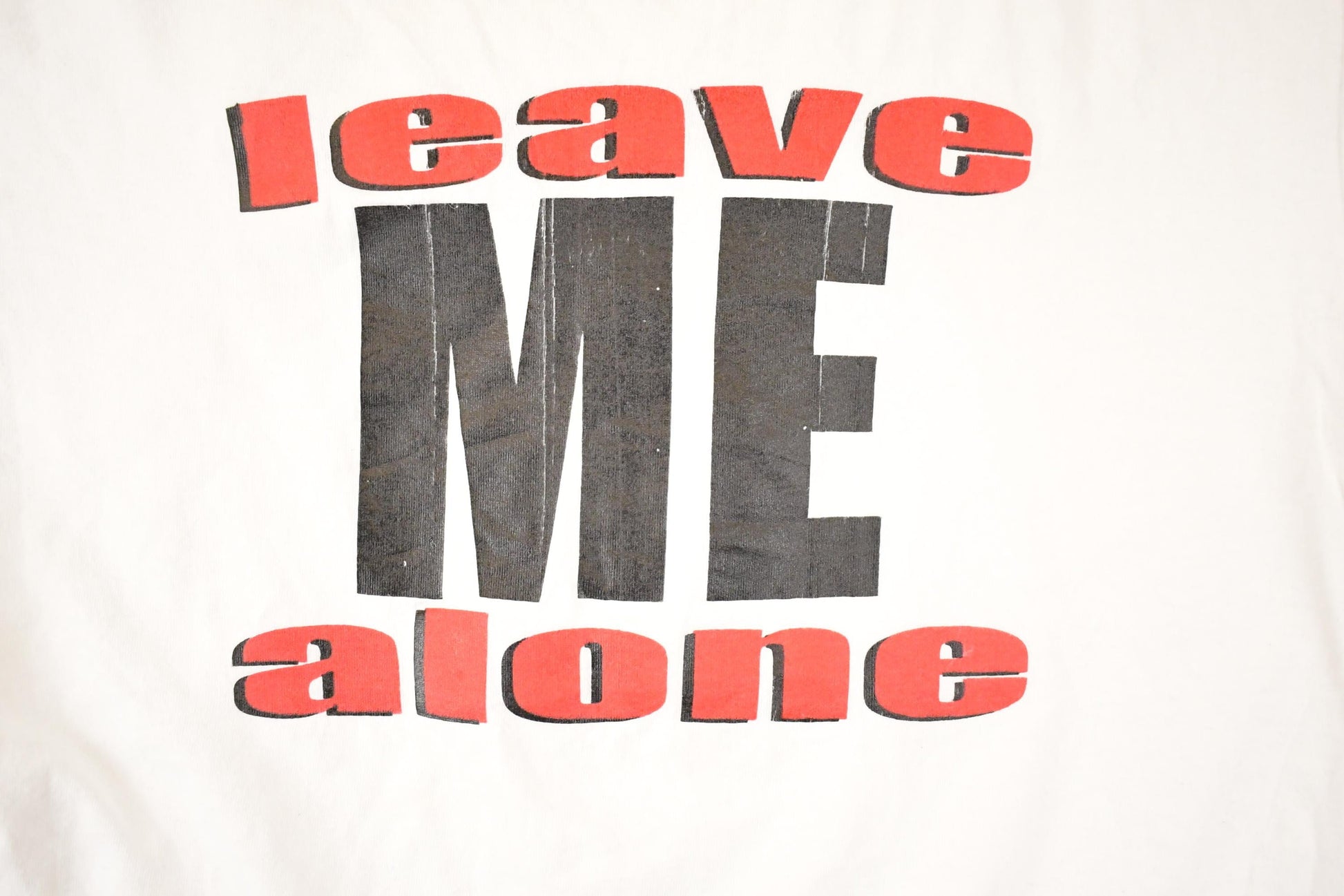 Vintage 1990s Leave Me Alone Big Text Souvenir Attitude T-Shirt Men's L from propervintagecanada