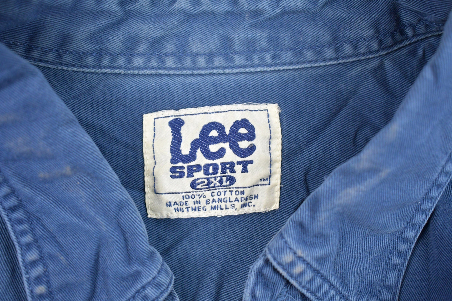 Vintage 1990s Lee Sport Denim Button Up Shirt Men's 2XL from propervintagecanada