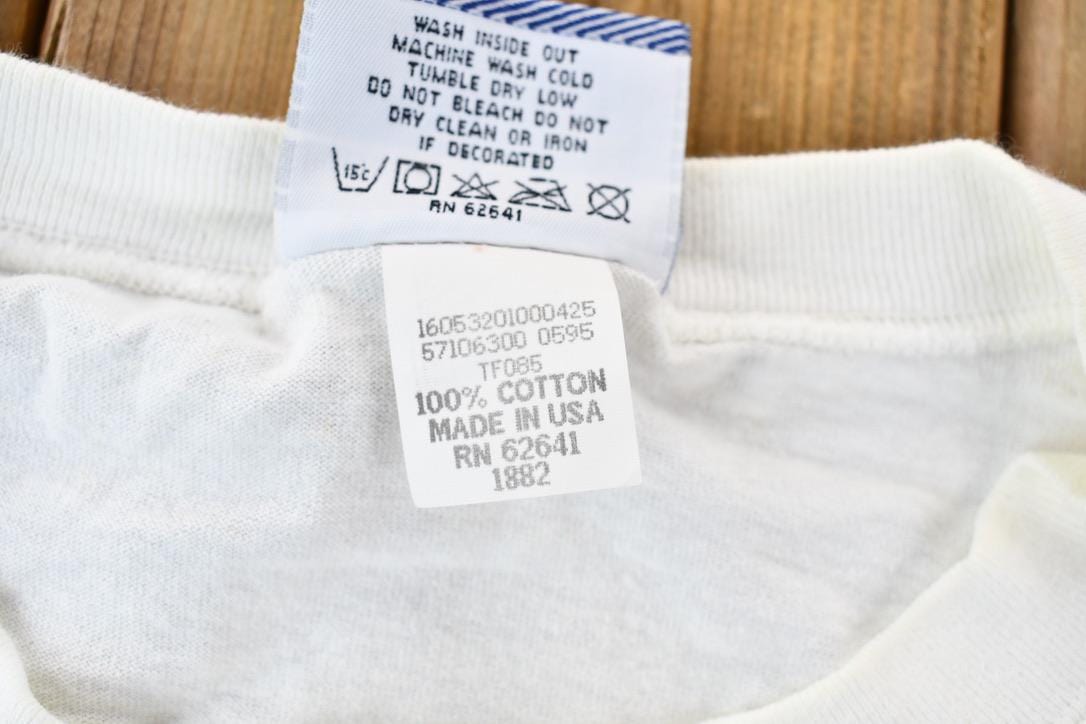 Vintage 1990s Lee Sport Single Stitch Nutmeg Graphic Flower Bouquet T-Shirt Men's XL from propervintagecanada