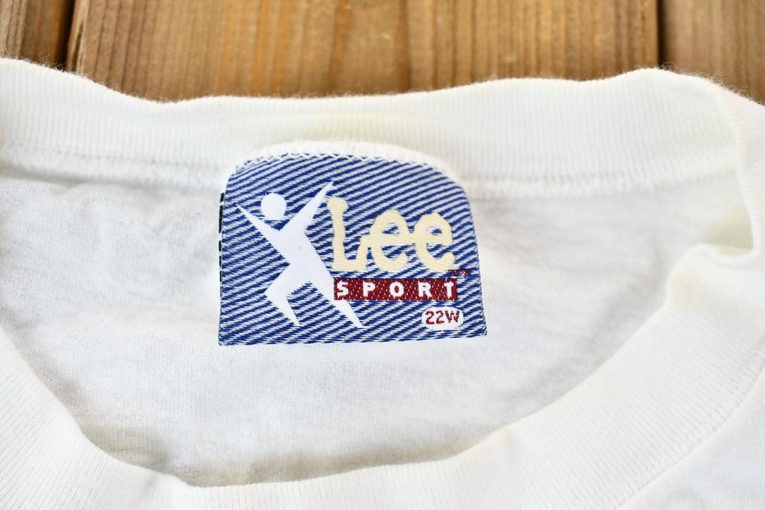 Vintage 1990s Lee Sport Single Stitch Nutmeg Graphic Flower Bouquet T-Shirt Men's XL from propervintagecanada