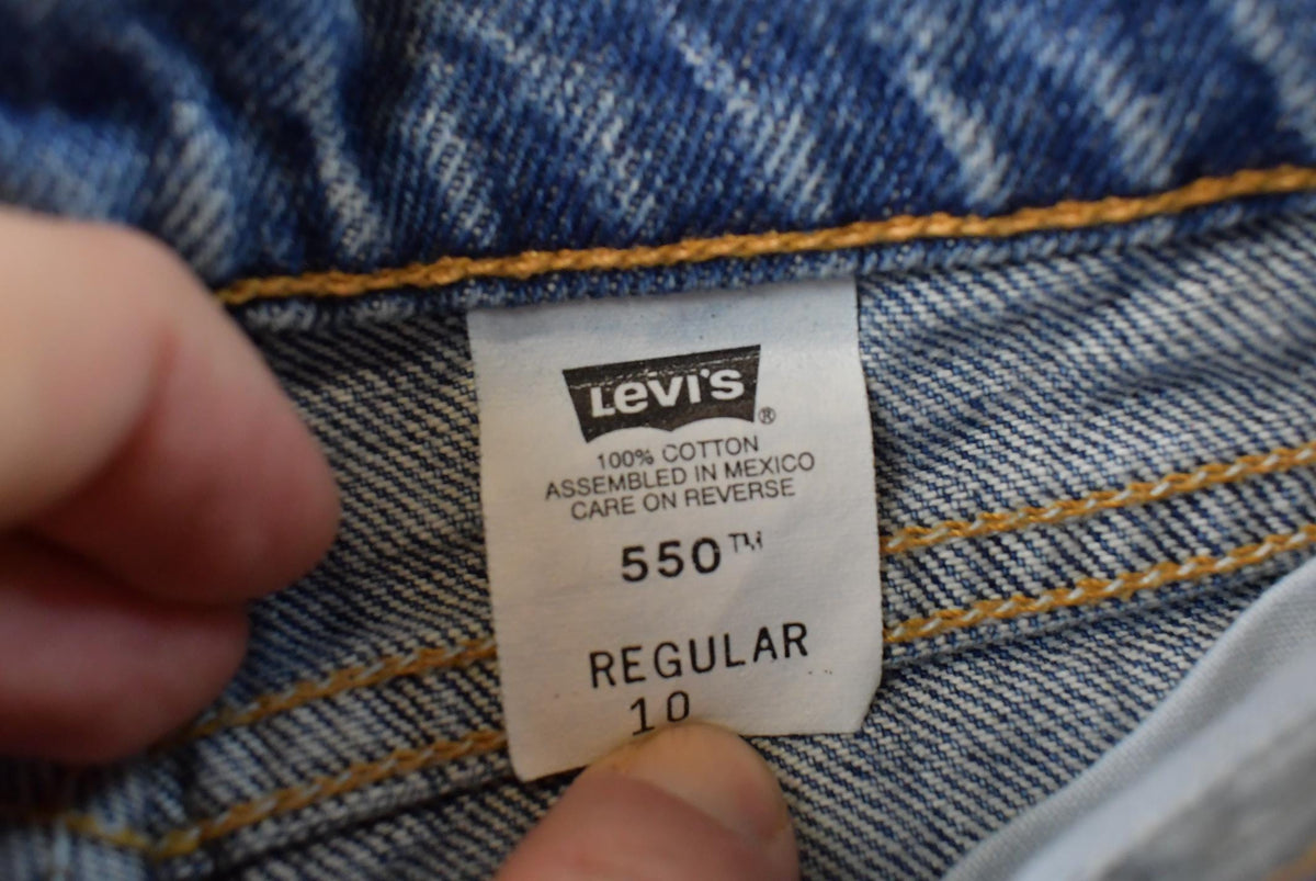 Vintage 1990s Levi's 550 Regular Fit Denim Blue Jeans Youth 22 x 24.5 from propervintagecanada