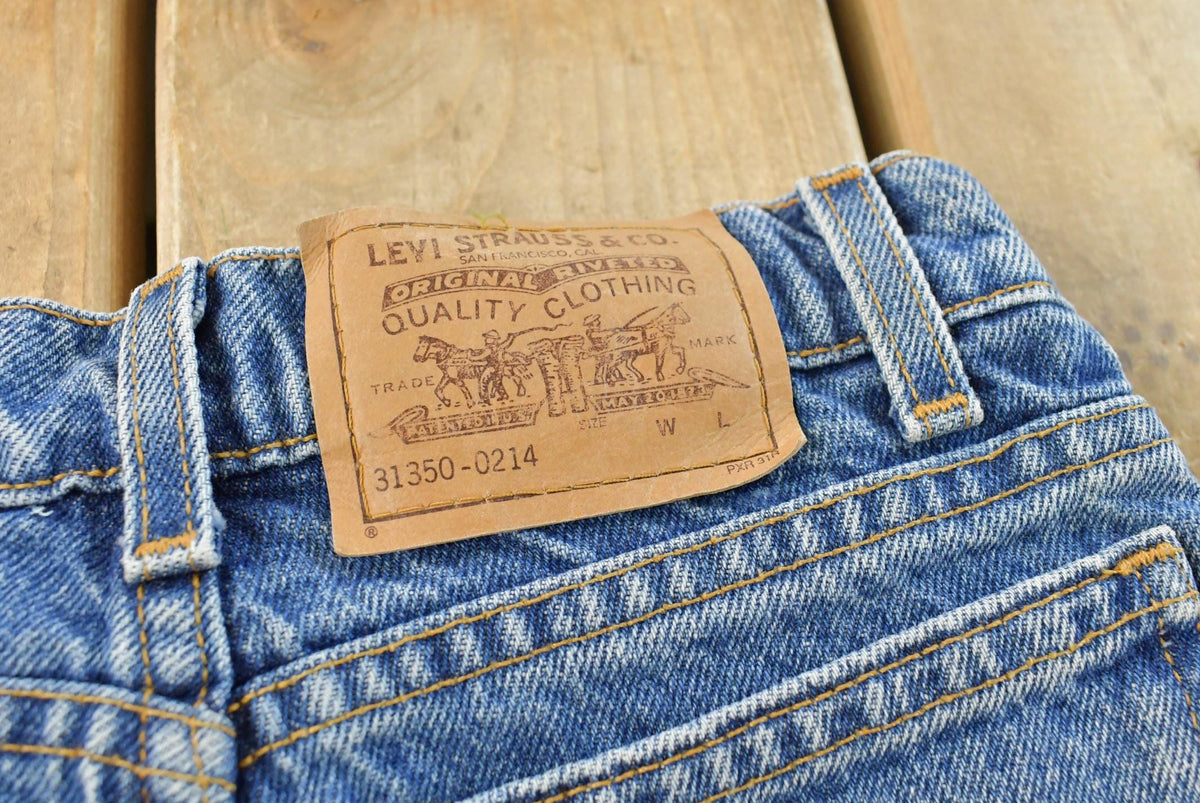 Vintage 1990s Levi's 550 Regular Fit Denim Blue Jeans Youth 22 x 24.5 from propervintagecanada