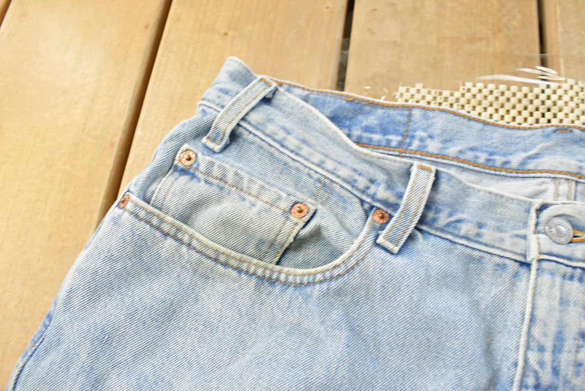Vintage 1990s Levi's 550 Relaxed Denim Blue Jeans Men's 37 x 33.5 from propervintagecanada