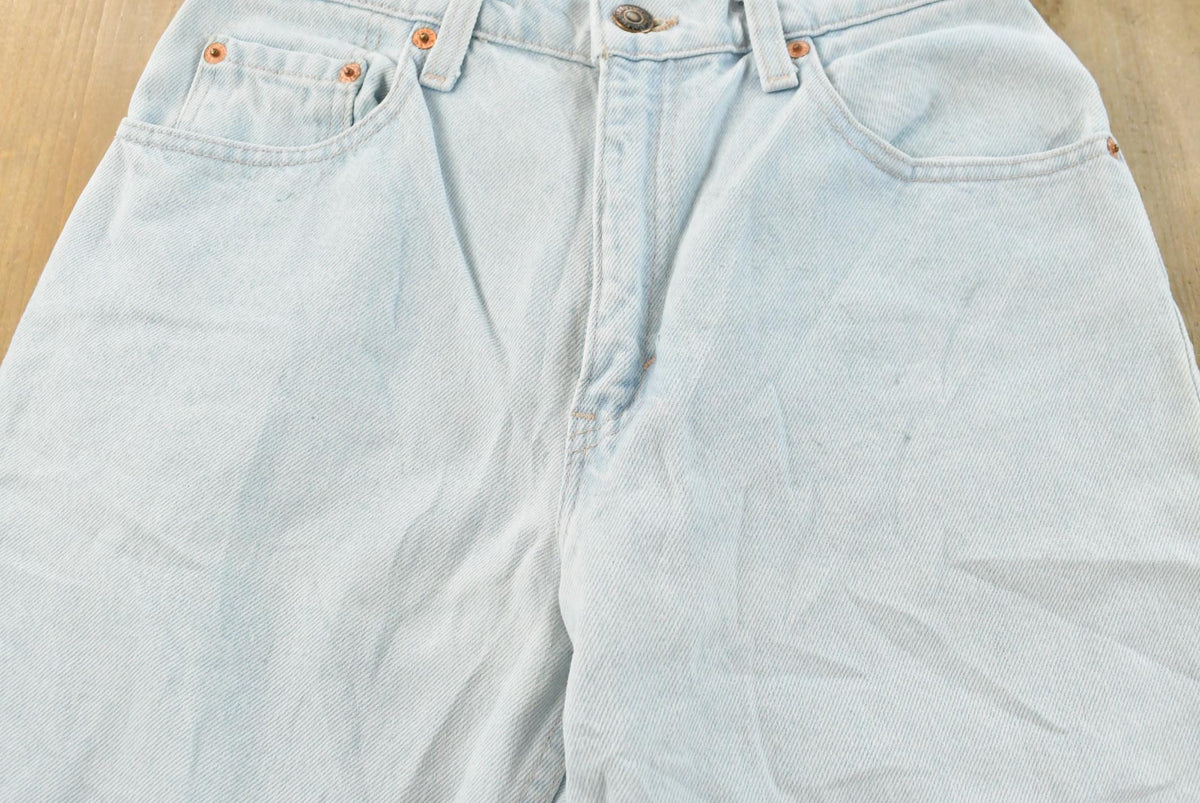 Vintage 1990s Levi's 550 Relaxed Fit Denim Light Wash Blue Jeans Men's 26 x 30 from propervintagecanada