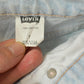 Vintage 1990s Levi's 550 Relaxed Fit Denim Light Wash Blue Jeans Men's 26 x 30 from propervintagecanada