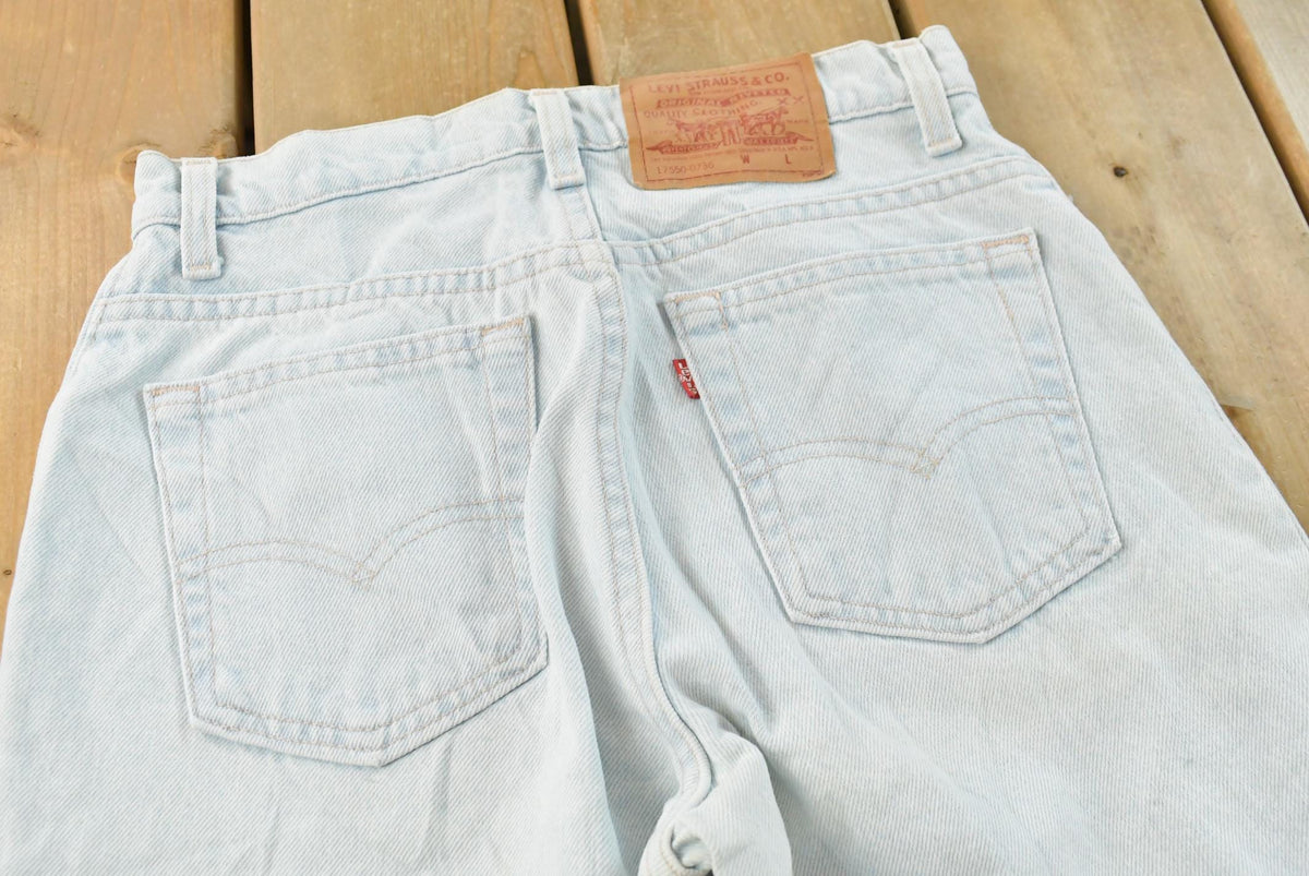 Vintage 1990s Levi's 550 Relaxed Fit Denim Light Wash Blue Jeans Men's 26 x 30 from propervintagecanada