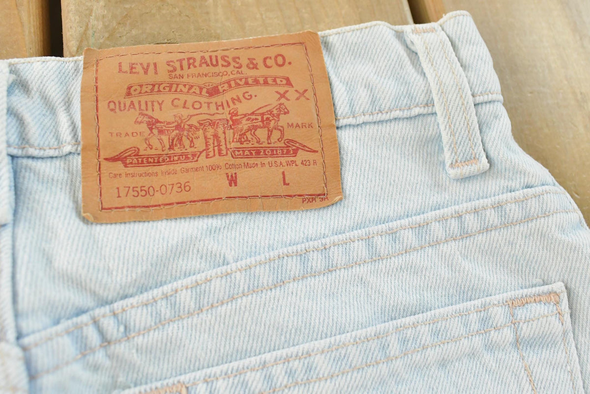 Vintage 1990s Levi's 550 Relaxed Fit Denim Light Wash Blue Jeans Men's 26 x 30 from propervintagecanada