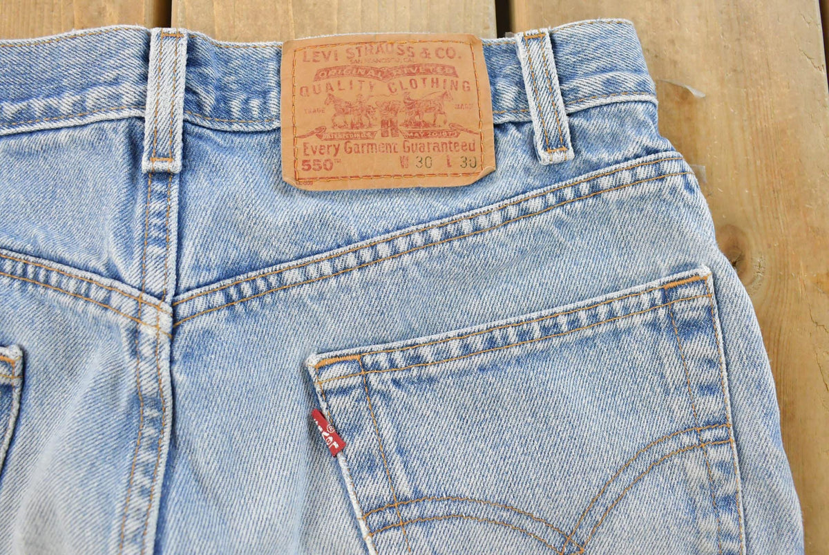 Vintage 1990s Levi's 550 Relaxed Fit Distressed Denim Jeans Men's 28 x 29 from propervintagecanada