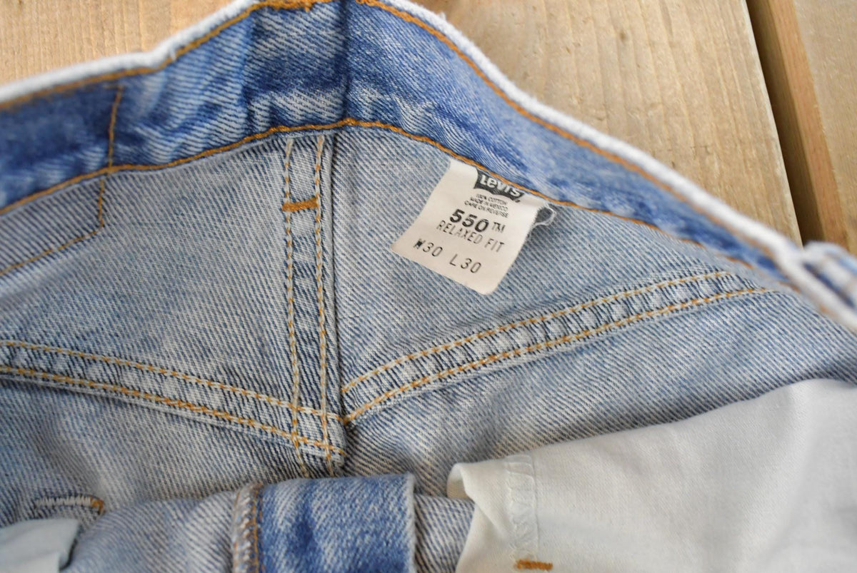 Vintage 1990s Levi's 550 Relaxed Fit Distressed Denim Jeans Men's 28 x 29 from propervintagecanada