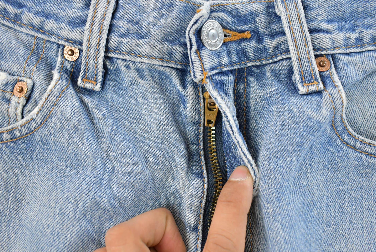 Vintage 1990s Levi's 550 Relaxed Fit Distressed Denim Jeans Men's 28 x 29 from propervintagecanada