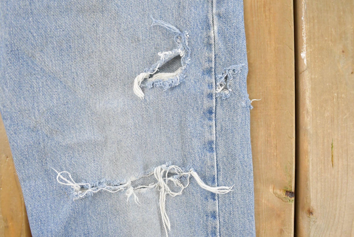 Vintage 1990s Levi's 550 Relaxed Fit Distressed Denim Jeans Men's 28 x 29 from propervintagecanada