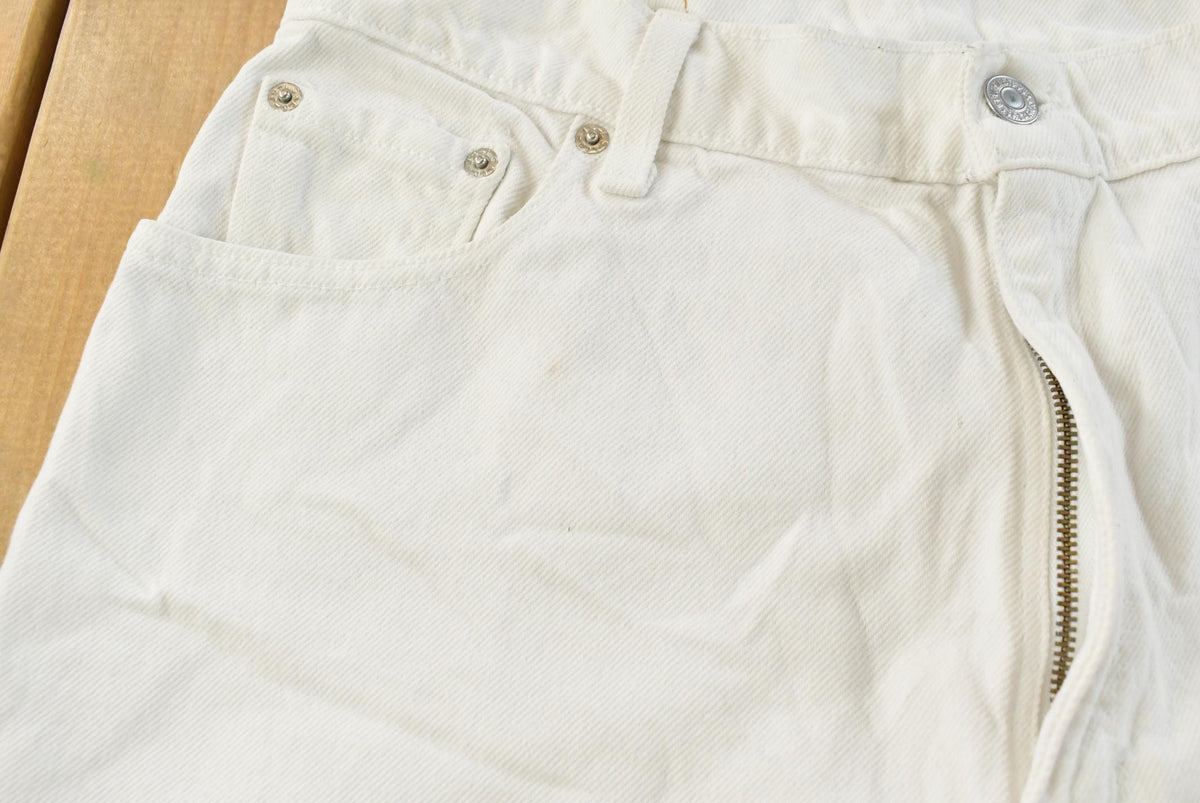 Vintage 1990s Levi's 550 Relaxed Fit Tapered Leg Denim White Jeans Women's 22 x 24.5 from propervintagecanada