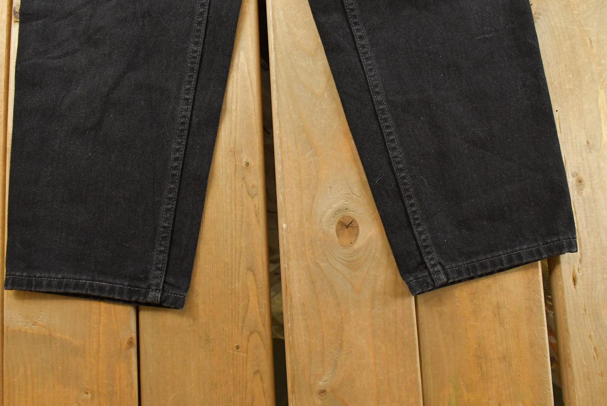Vintage 1990s Levi's 550 Relaxed Tapered Black Denim Jeans Women's 31 x 27 from propervintagecanada