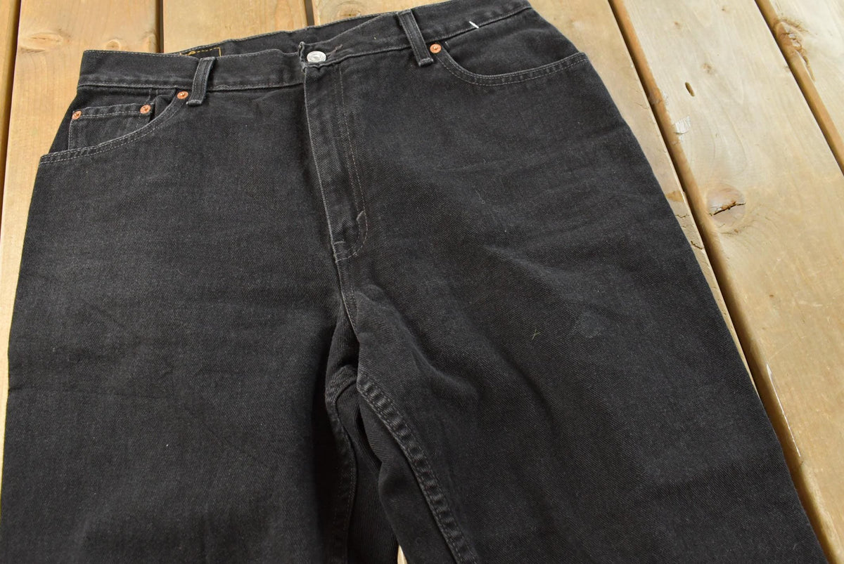 Vintage 1990s Levi's 550 Relaxed Tapered Black Denim Jeans Women's 31 x 27 from propervintagecanada