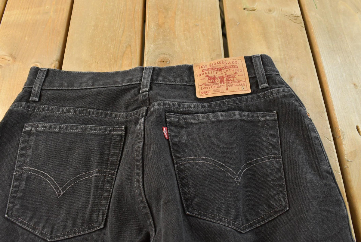 Vintage 1990s Levi's 550 Relaxed Tapered Black Denim Jeans Women's 31 x 27 from propervintagecanada