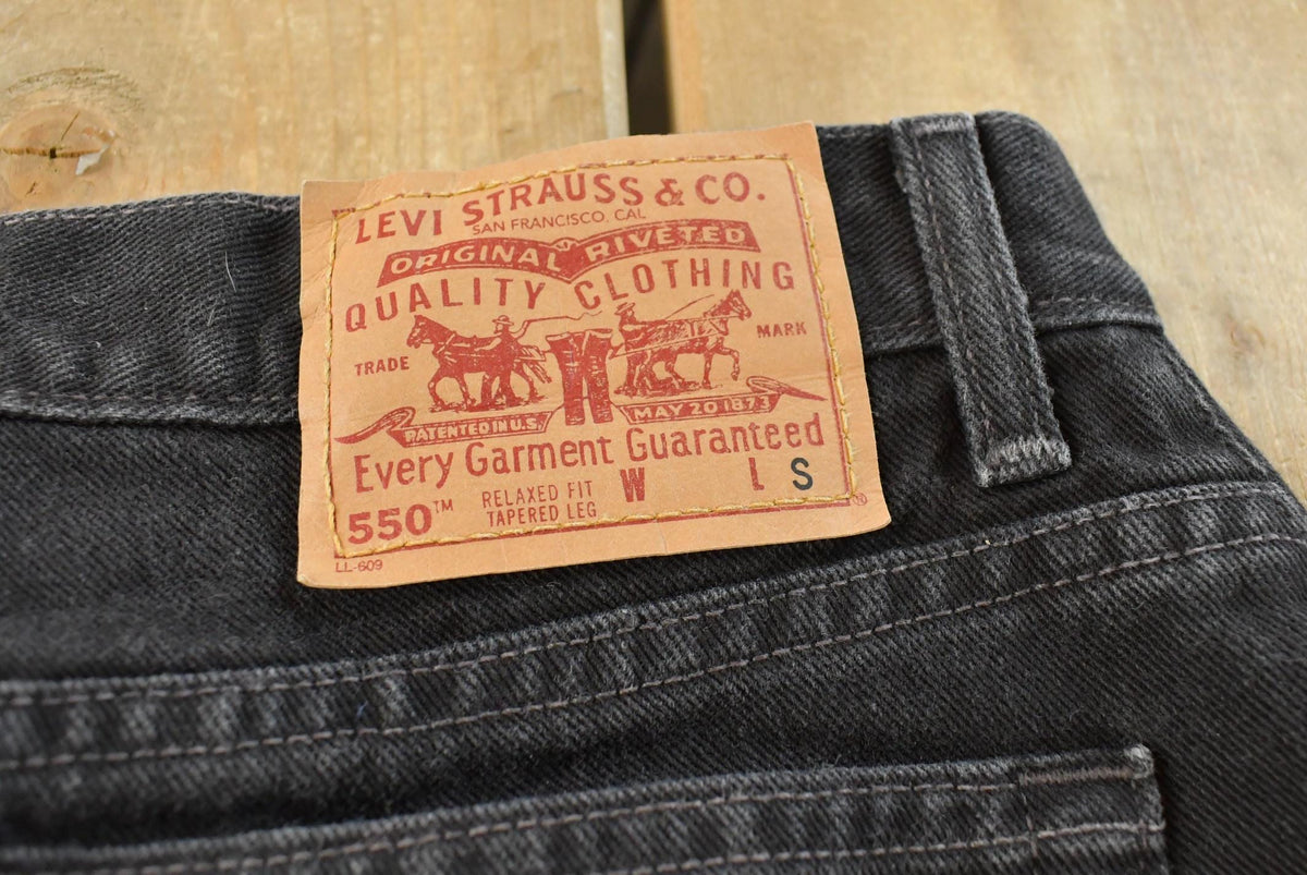 Vintage 1990s Levi's 550 Relaxed Tapered Black Denim Jeans Women's 31 x 27 from propervintagecanada