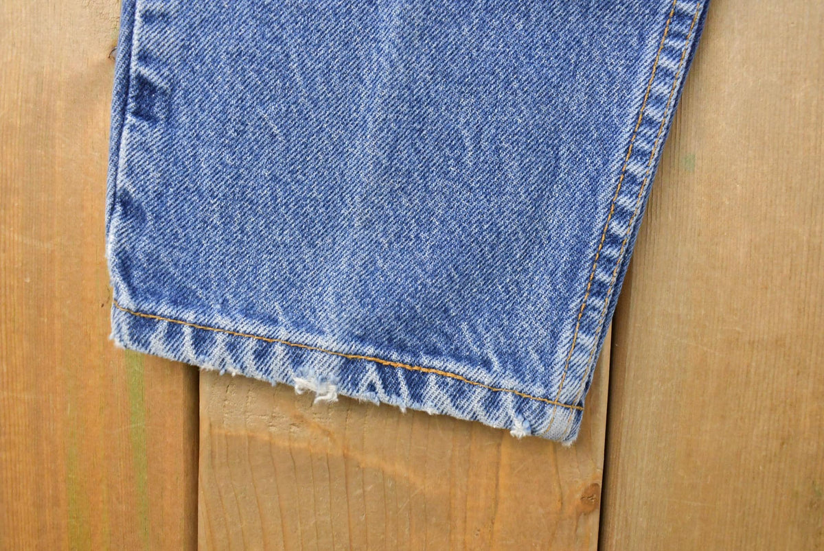 Vintage 1990s Levi's 551 Relaxed Tapered Fit Denim Jeans Women's 33 x 30 from propervintagecanada