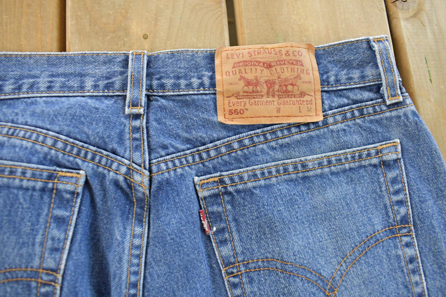 Vintage 1990s Levi's 560 Loose Straight Denim Jeans Women's 32 x 31 from propervintagecanada