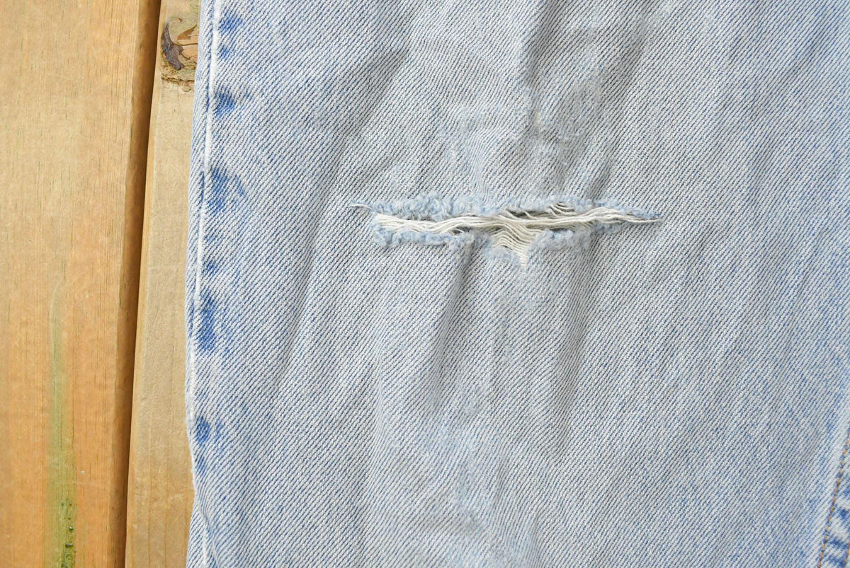 Vintage 1990s Levi's 560 Loose Tapered Denim Jeans Men's 26 x 31 from propervintagecanada