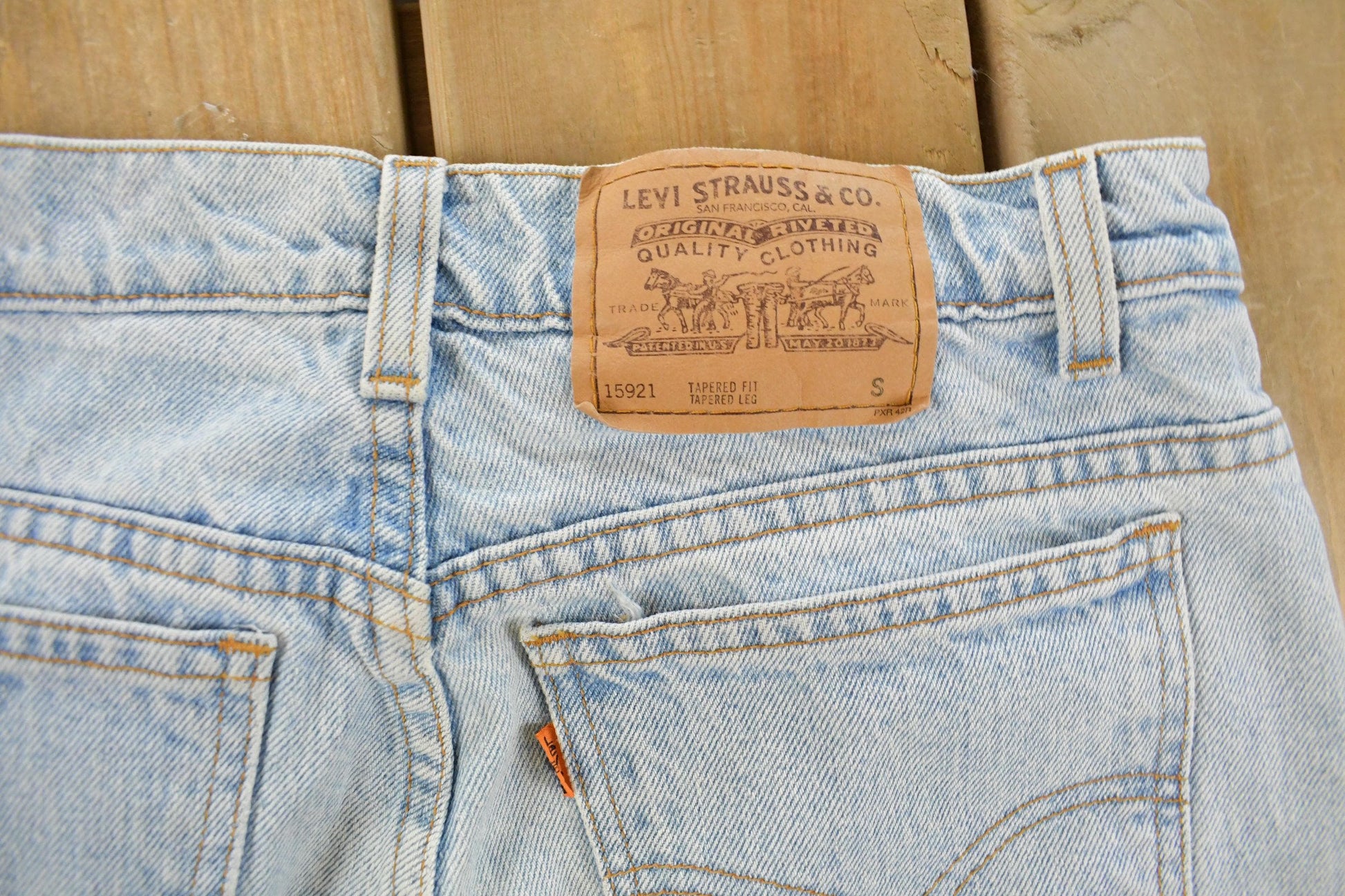 Vintage 1990s Levi's 921 Tapered Fit Denim Jeans Women's 32 x 29 / 90s Levi's / Distressed Sun Faded Jeans from propervintagecanada