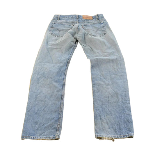 Vintage 1990s Levi's Distressed 505 Regular Straight Denim Jeans Men's 33 x 32 from propervintagecanada