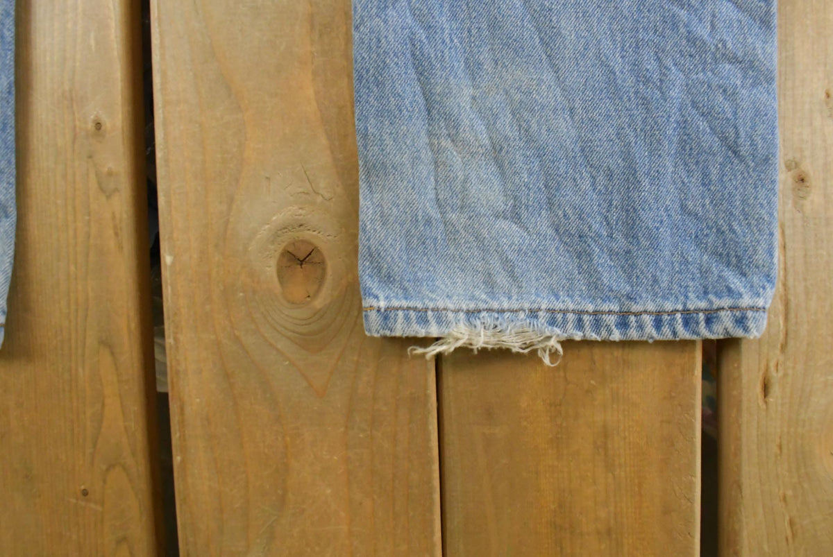 Vintage 1990s Levi's Distressed 505 Regular Straight Denim Jeans Men's 33 x 32 from propervintagecanada