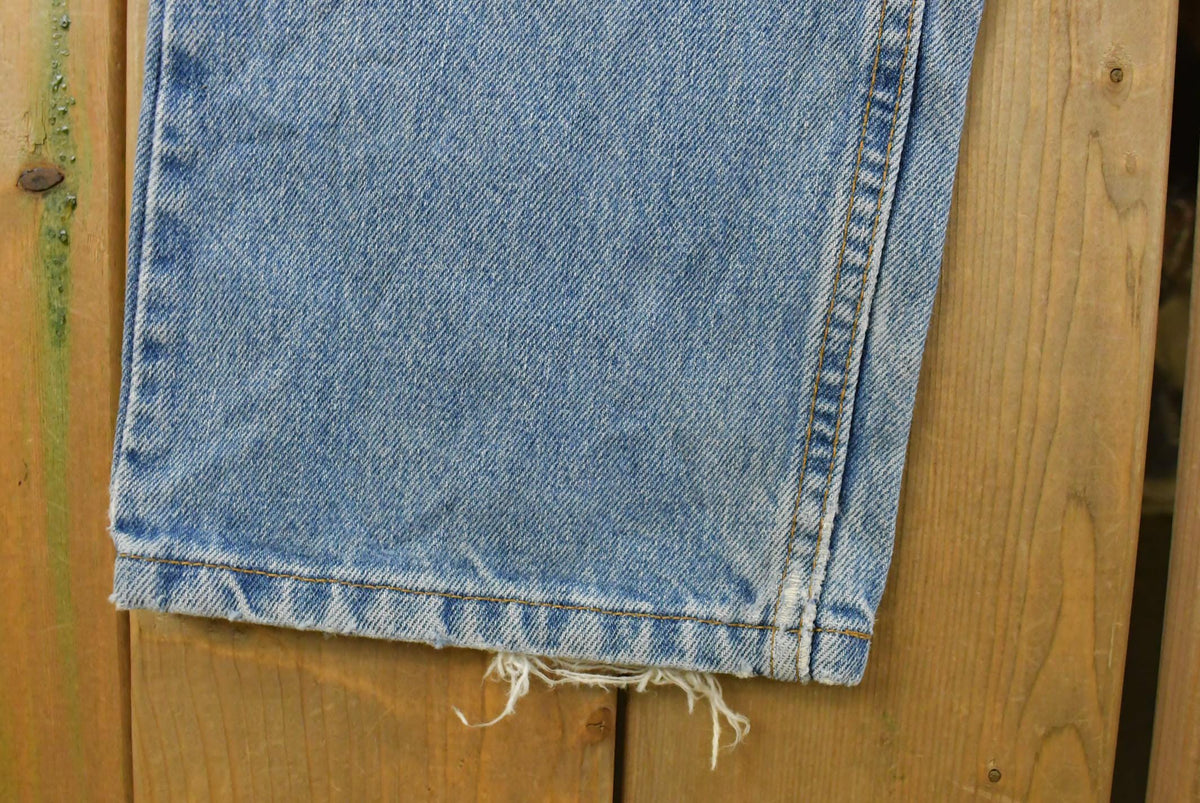 Vintage 1990s Levi's Distressed 505 Regular Straight Denim Jeans Men's 33 x 32 from propervintagecanada