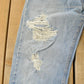 Vintage 1990s Levi's Distressed 505 Regular Straight Denim Jeans Men's 33 x 32 from propervintagecanada
