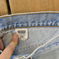 Vintage 1990s Levi's Distressed 550 Relaxed Fit Denim Jeans Men's 33 x 33 from propervintagecanada