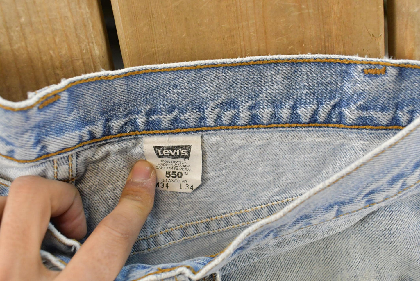 Vintage 1990s Levi's Distressed 550 Relaxed Fit Denim Jeans Men's 33 x 33 from propervintagecanada