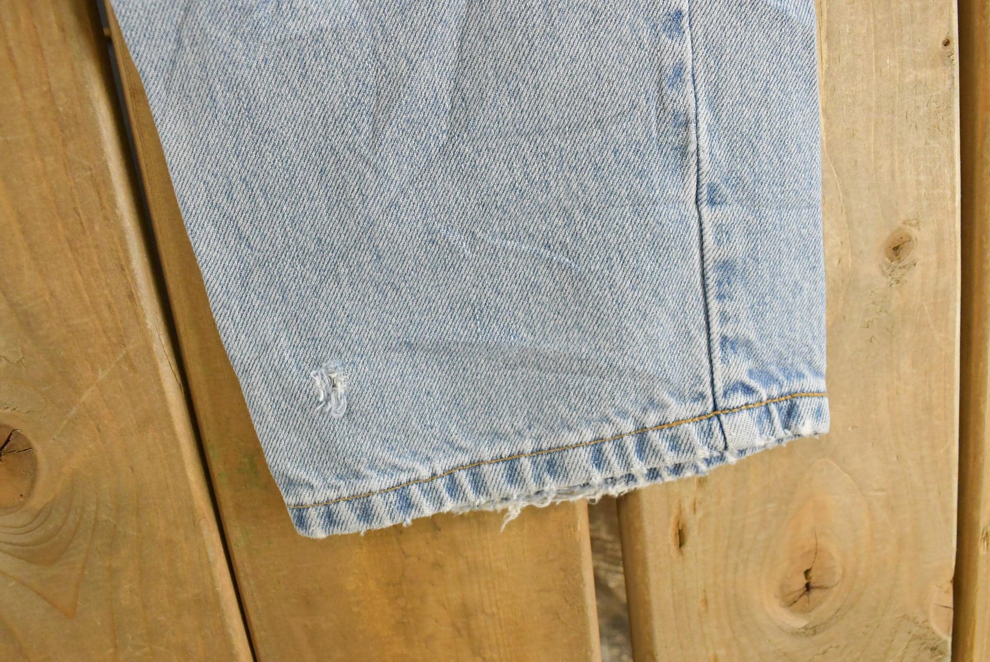 Vintage 1990s Levi's Distressed 550 Relaxed Fit Denim Jeans Men's 33 x 33 from propervintagecanada