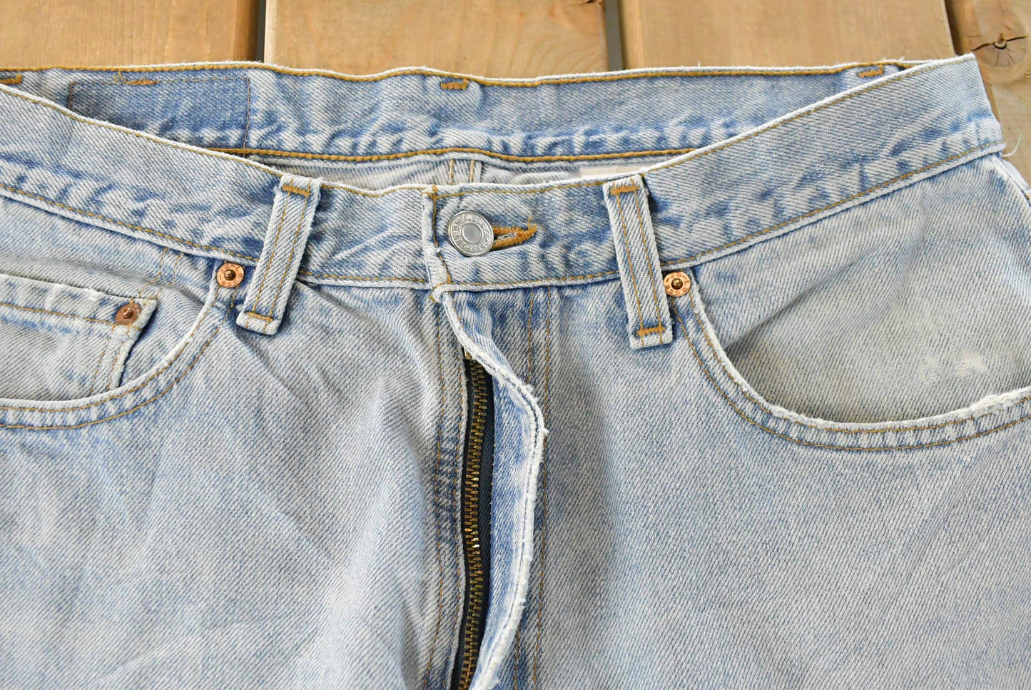 Vintage 1990s Levi's Distressed 550 Relaxed Fit Denim Jeans Men's 33 x 33 from propervintagecanada