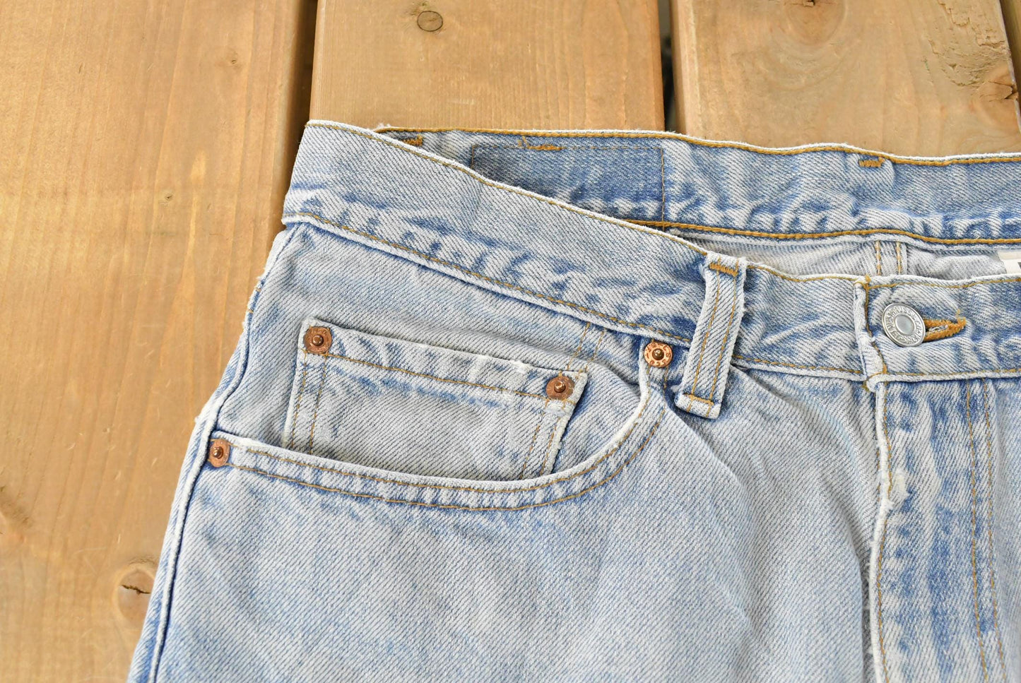 Vintage 1990s Levi's Distressed 550 Relaxed Fit Denim Jeans Men's 33 x 33 from propervintagecanada