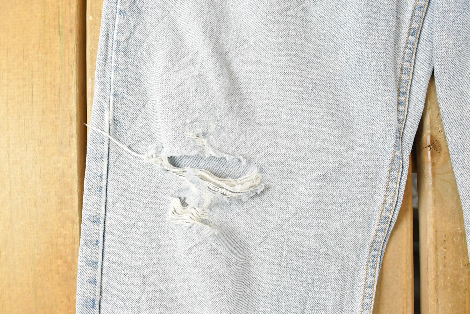 Vintage 1990s Levi's Distressed 550 Relaxed Fit Denim Jeans Men's 33 x 33 from propervintagecanada